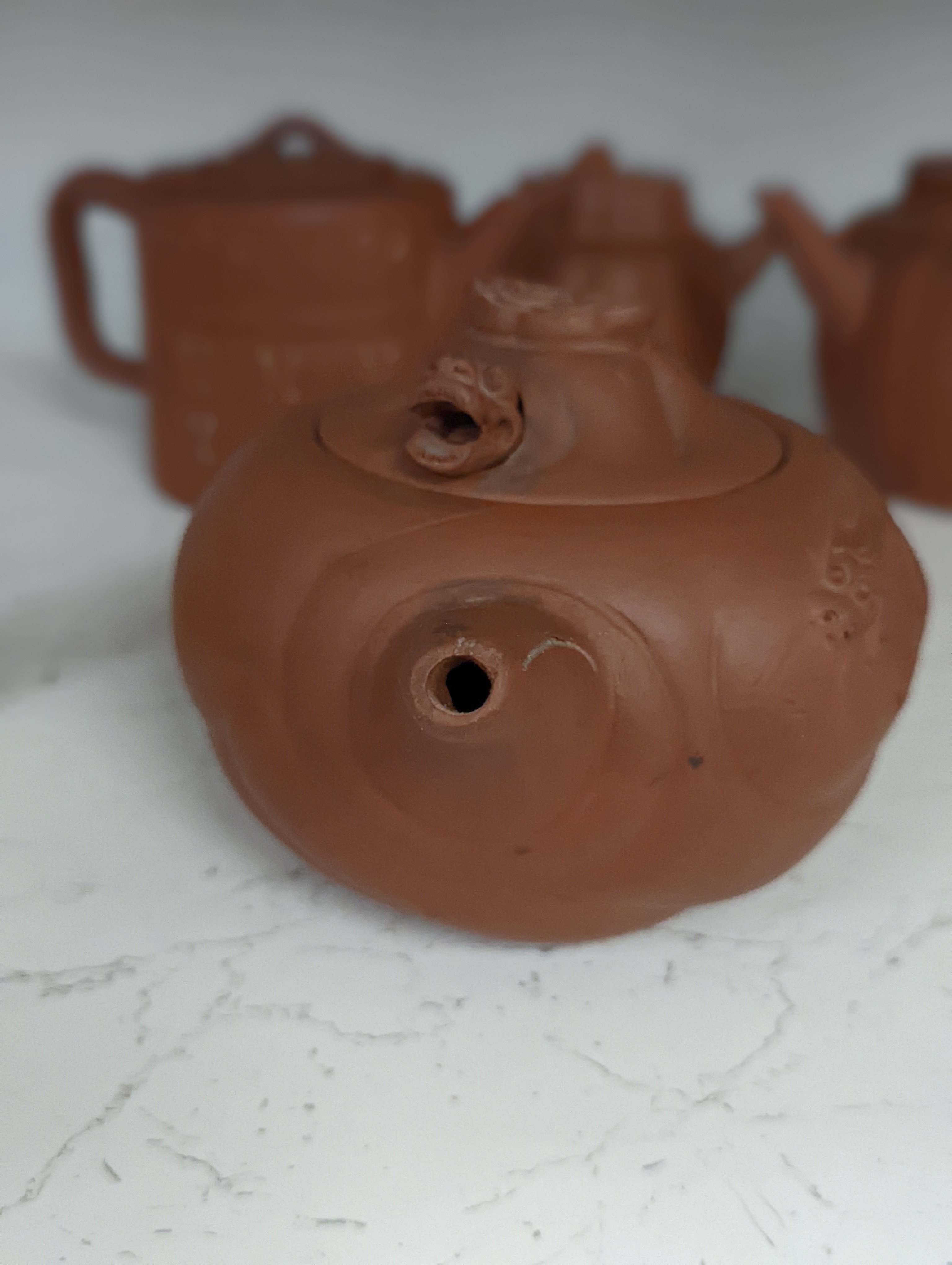 Six Chinese Yixing teapots, tallest 11cm